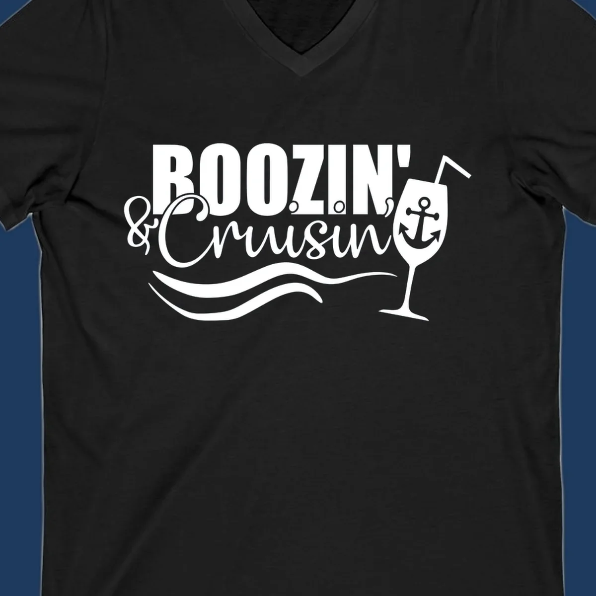 Boozin' and Cruising design with cocktail glass, anchor, and nautical waves in white on gray background