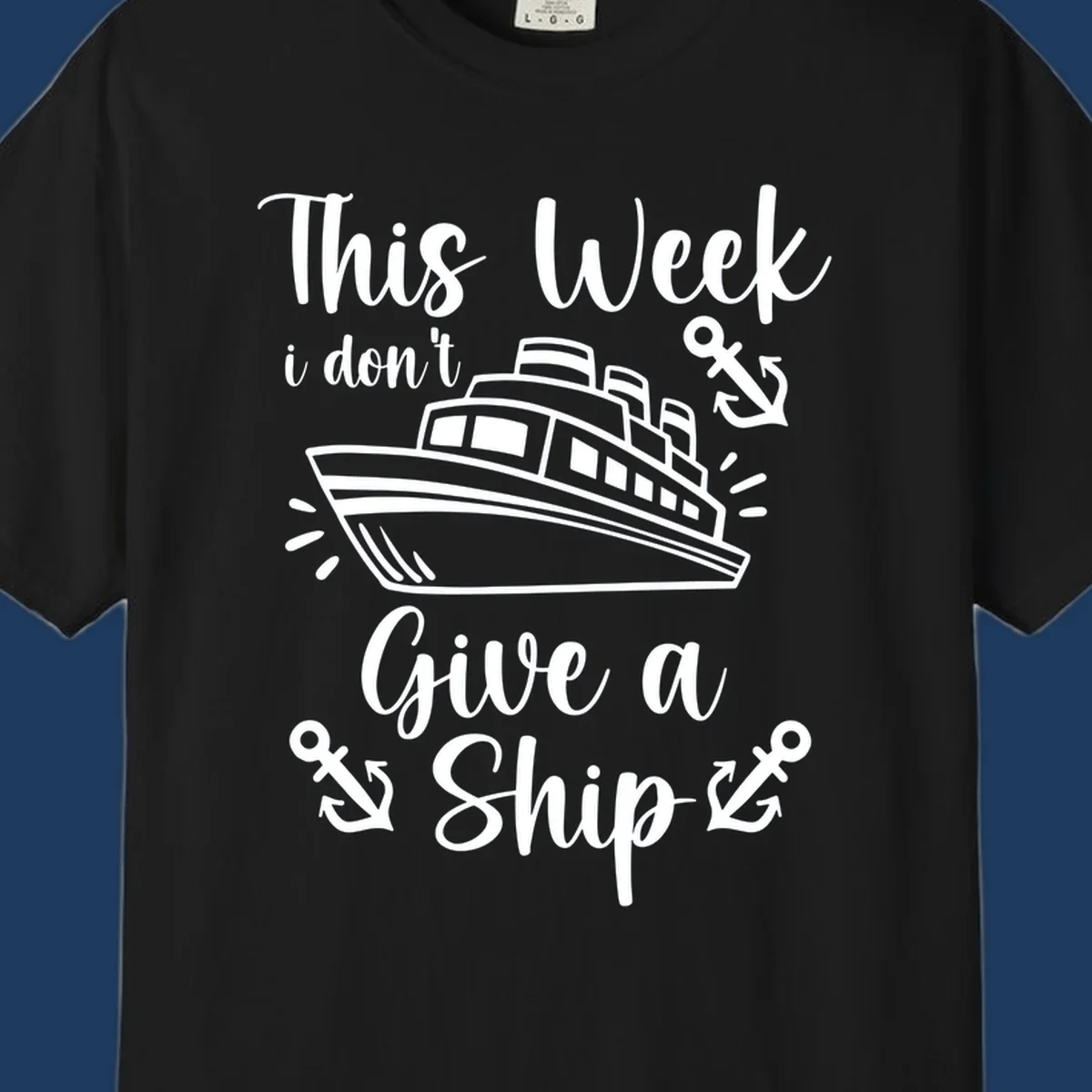 Gray and white nautical design with cruise ship and anchors, text reads 'This Week i don't Give a Ship' - don't give a ship cruise pun tee