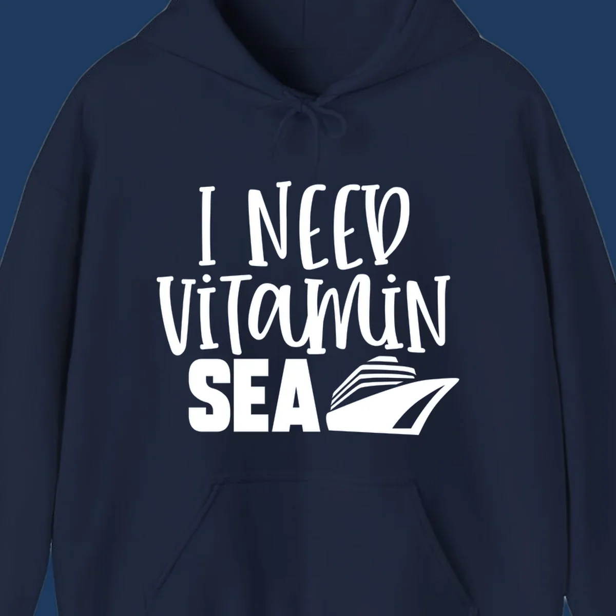 White text reading 'I NEED VITAMIN SEA' with a cruise ship illustration on gray background