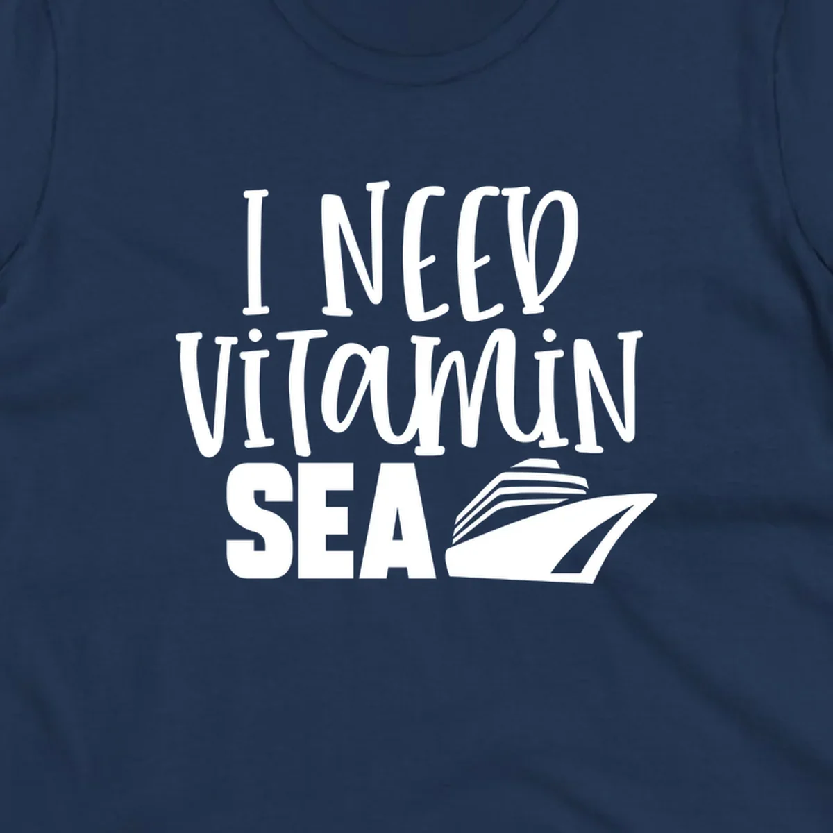 White text reading 'I NEED VITAMIN SEA' with a cruise ship illustration on gray background