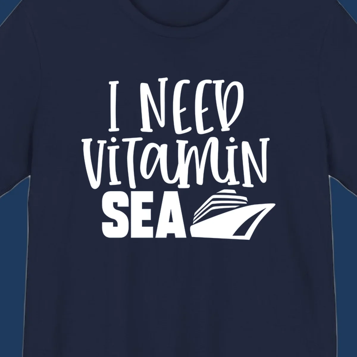 White text reading 'I NEED VITAMIN SEA' with a cruise ship illustration on gray background