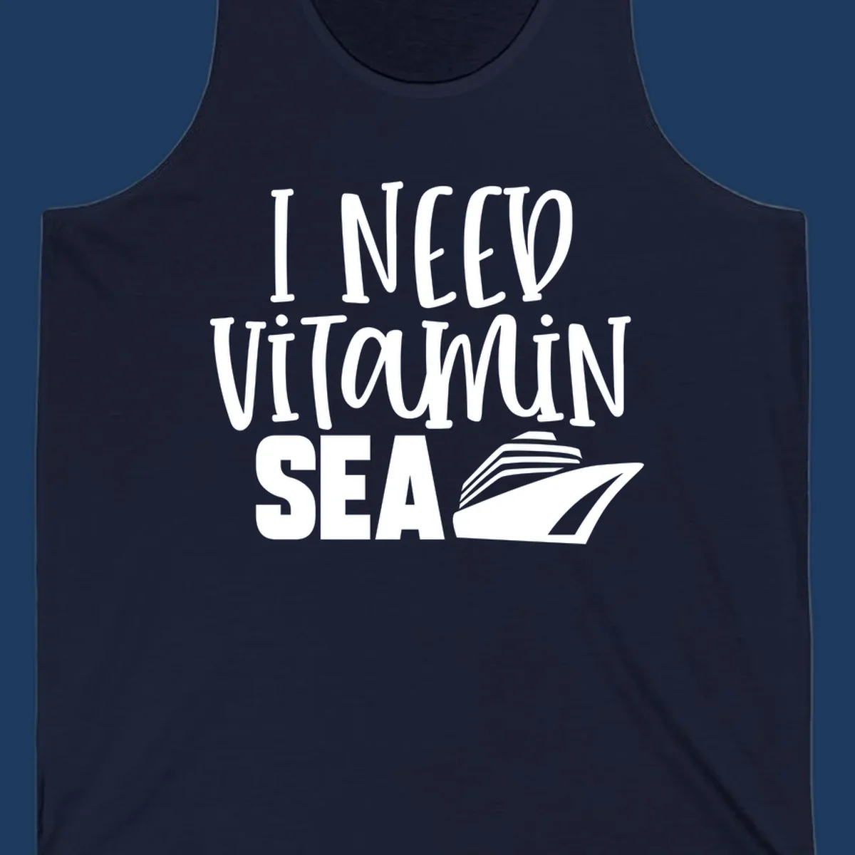 White text reading 'I NEED VITAMIN SEA' with a cruise ship illustration on gray background