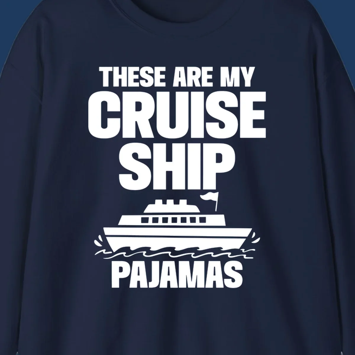 Cruise ship pajamas design with bold text and illustrated ship with ocean waves on gray background