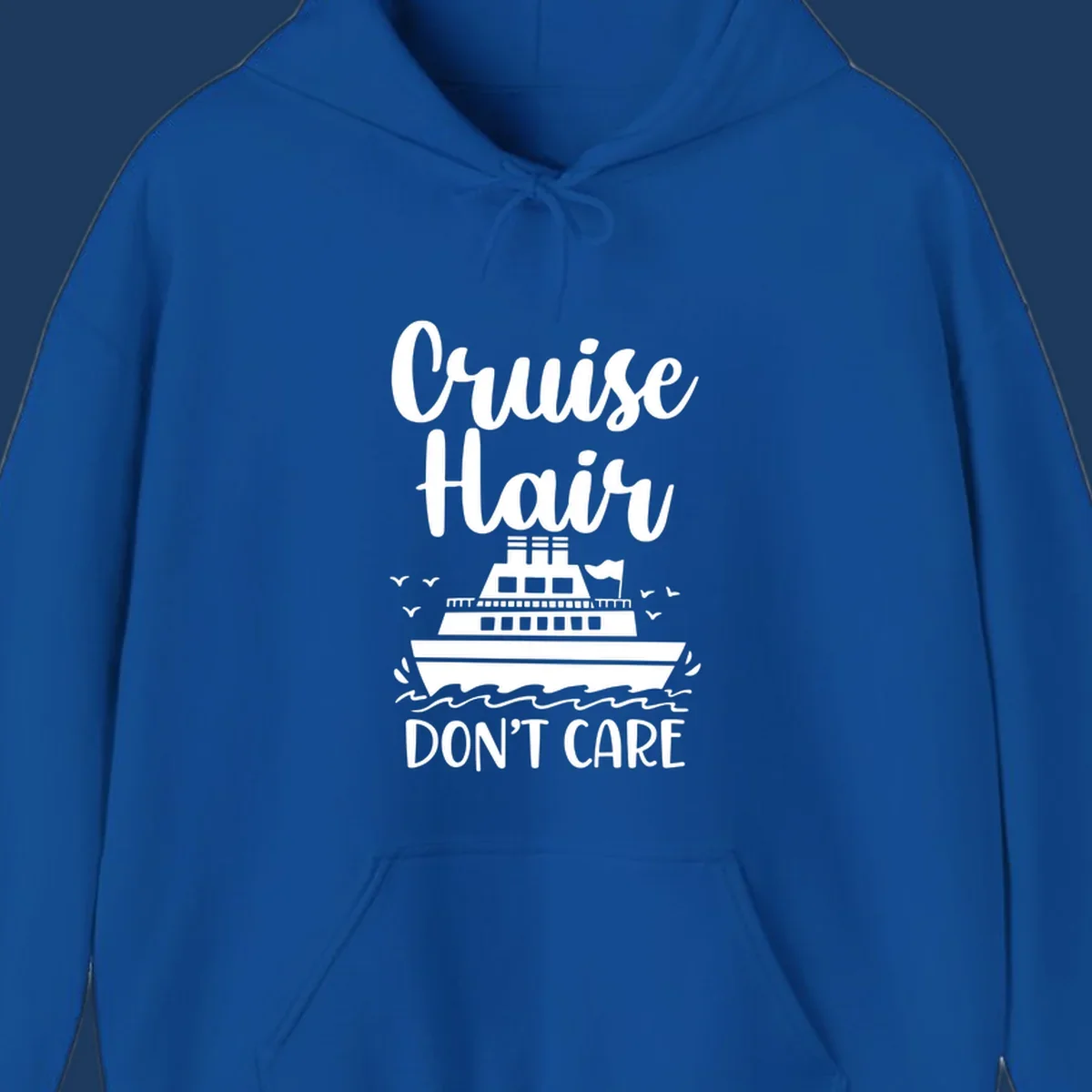 Cruise hair don't care design featuring a white cruise ship on ocean waves with seagulls, playful vacation lettering on gray background