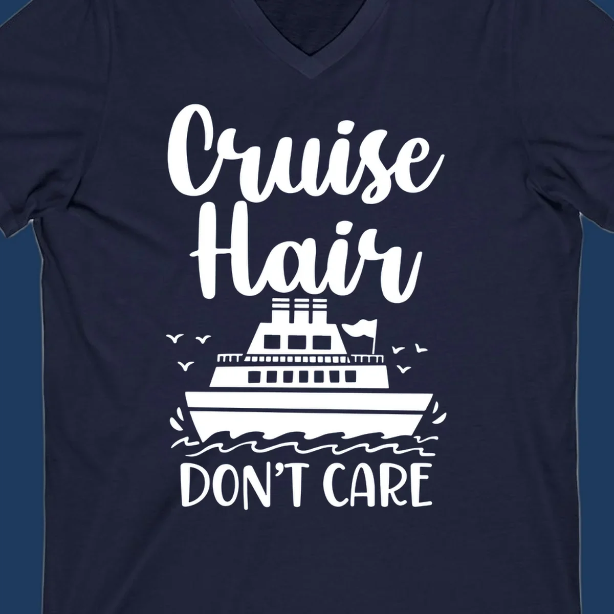 Cruise hair don't care design featuring a white cruise ship on ocean waves with seagulls, playful vacation lettering on gray background