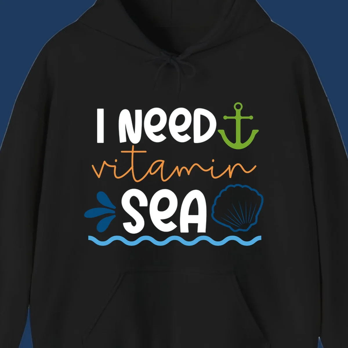 Nautical design with 'I NEED vitamin SEA' text, green anchor, orange waves, blue shell and water droplets on gray background