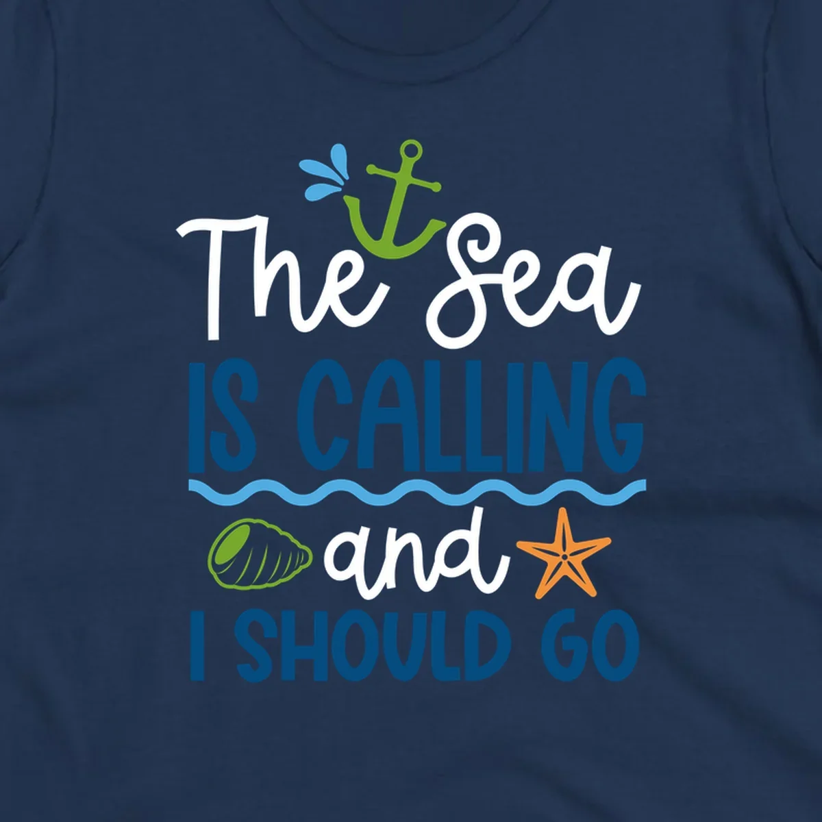 Gray tee design with 'The Sea Is Calling and I Should Go' text in white and blue, decorated with nautical icons including anchor, starfish, seashell, and ocean waves.