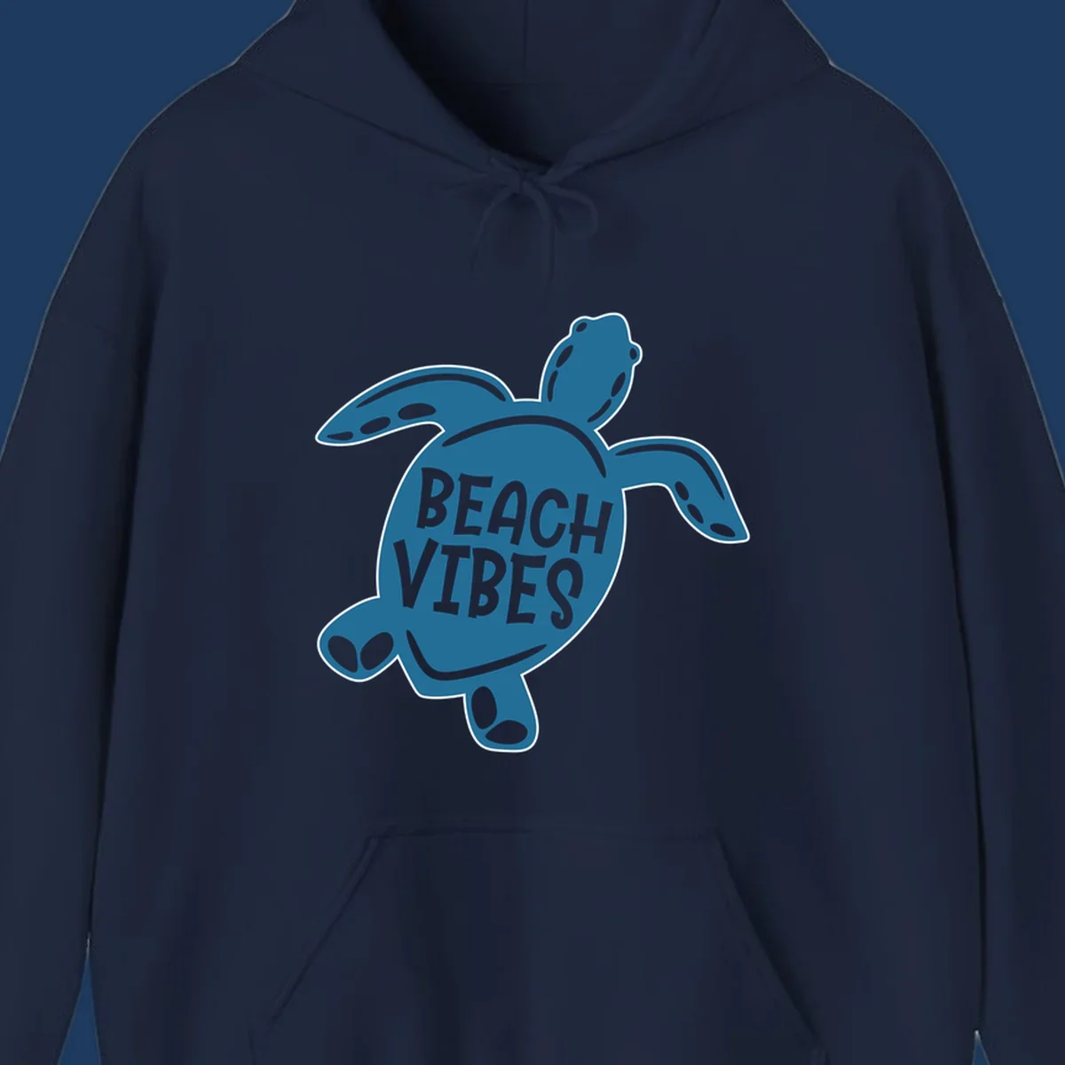 Teal sea turtle illustration with spotted shell pattern and 'Beach Vibes' text centered on the shell