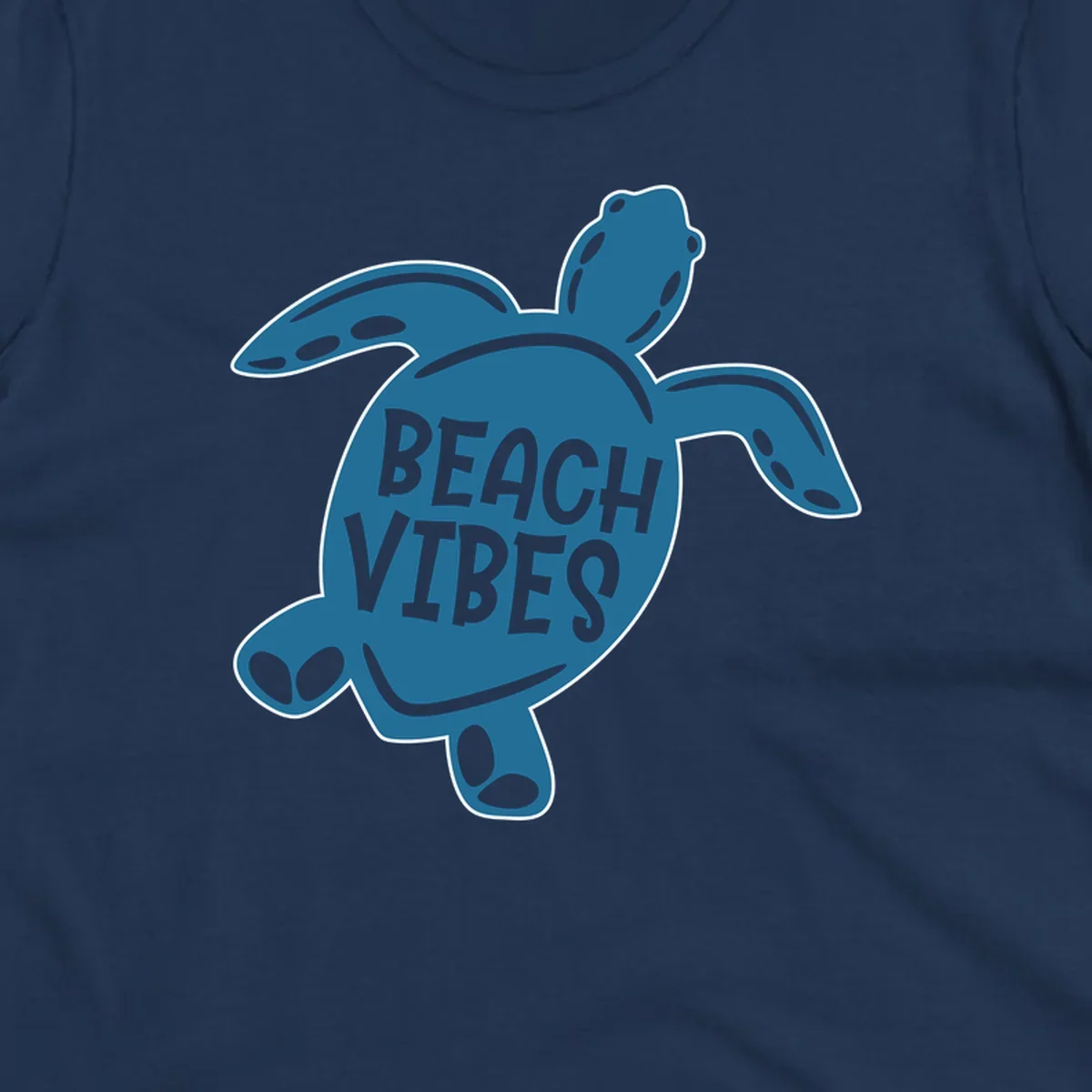 Teal sea turtle illustration with spotted shell pattern and 'Beach Vibes' text centered on the shell