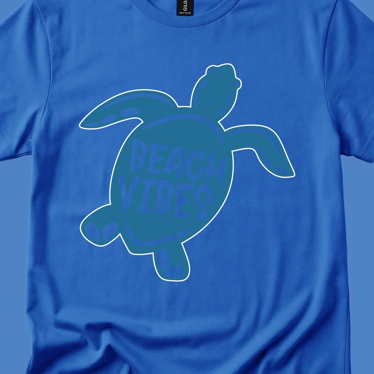 Teal sea turtle illustration with spotted shell pattern and 'Beach Vibes' text centered on the shell