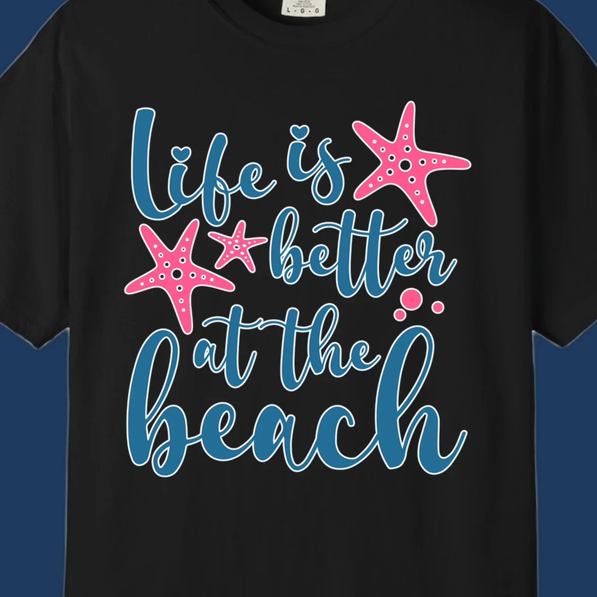 Life is better at the beach design with teal cursive text, pink starfish with white dots, and bubbles on gray background