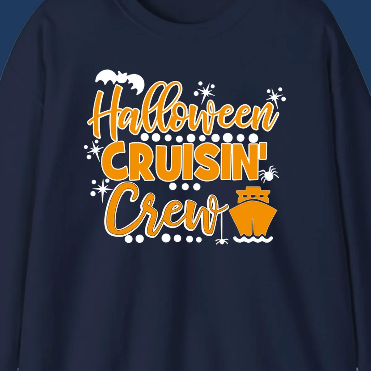 Orange and white Halloween Cruisin' Crew text with bat, cruise ship, and sparkle graphics on gray background