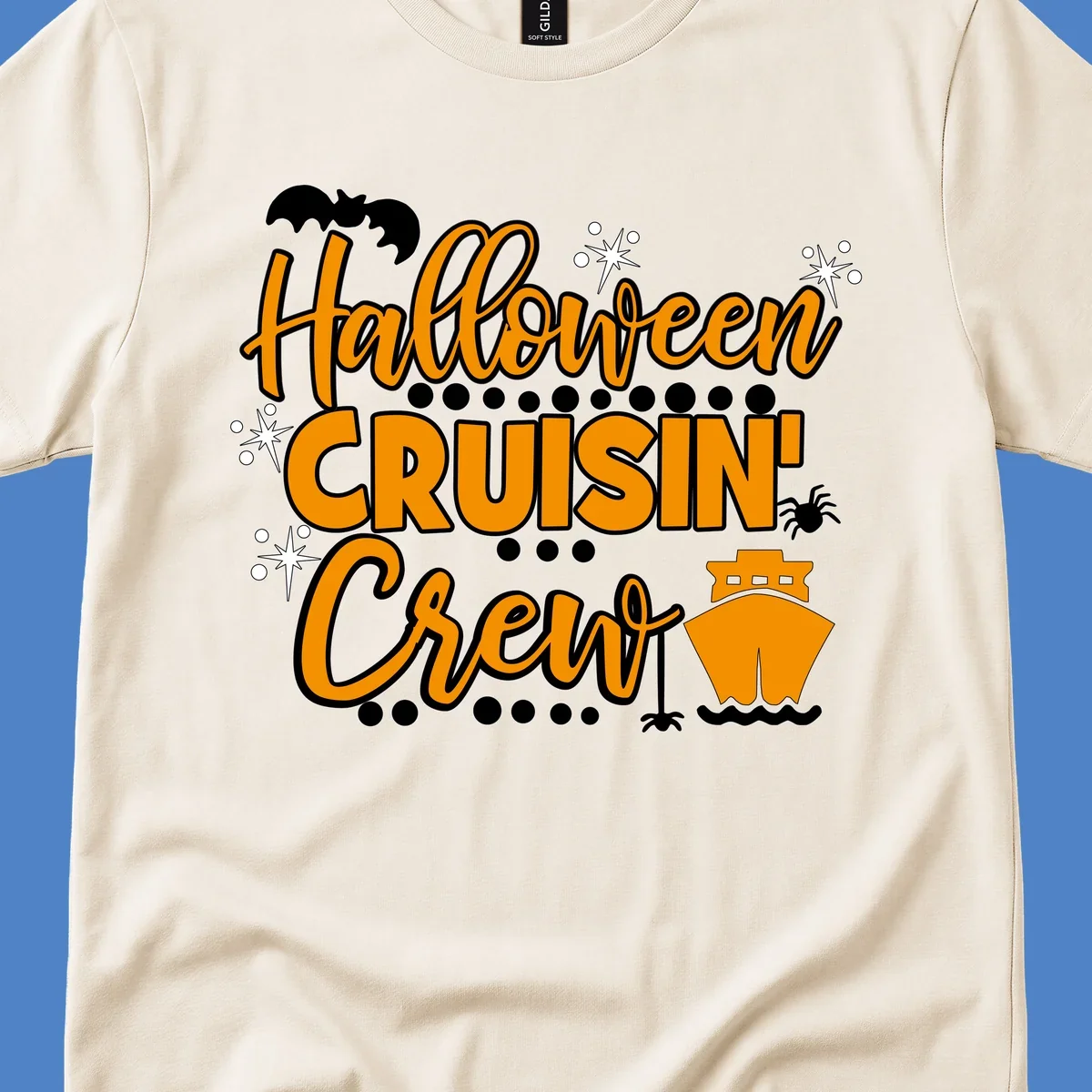 Orange and white Halloween Cruisin' Crew text with bat, cruise ship, and sparkle graphics on gray background