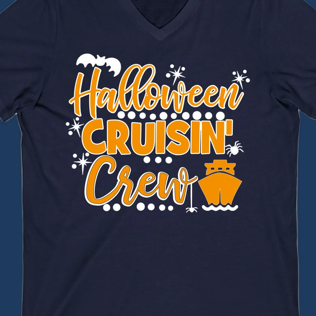 Orange and white Halloween Cruisin' Crew text with bat, cruise ship, and sparkle graphics on gray background