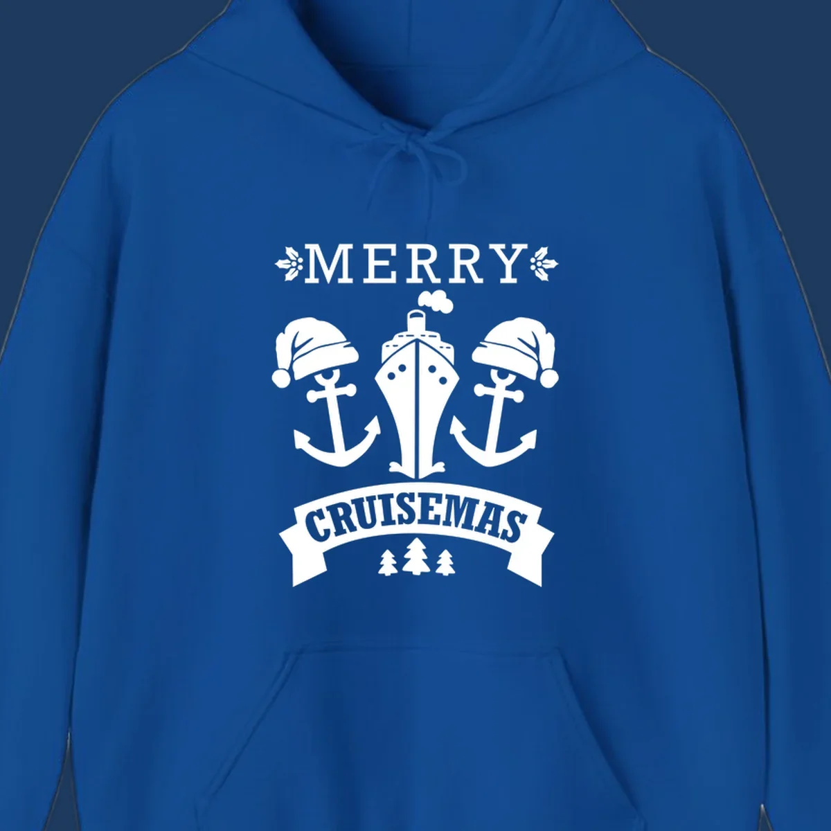 Merry Cruisemas nautical design featuring two Santa-hatted anchors and a ship with holly and evergreen trees on gray background.