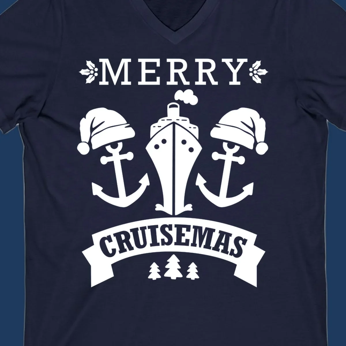 Merry Cruisemas nautical design featuring two Santa-hatted anchors and a ship with holly and evergreen trees on gray background.