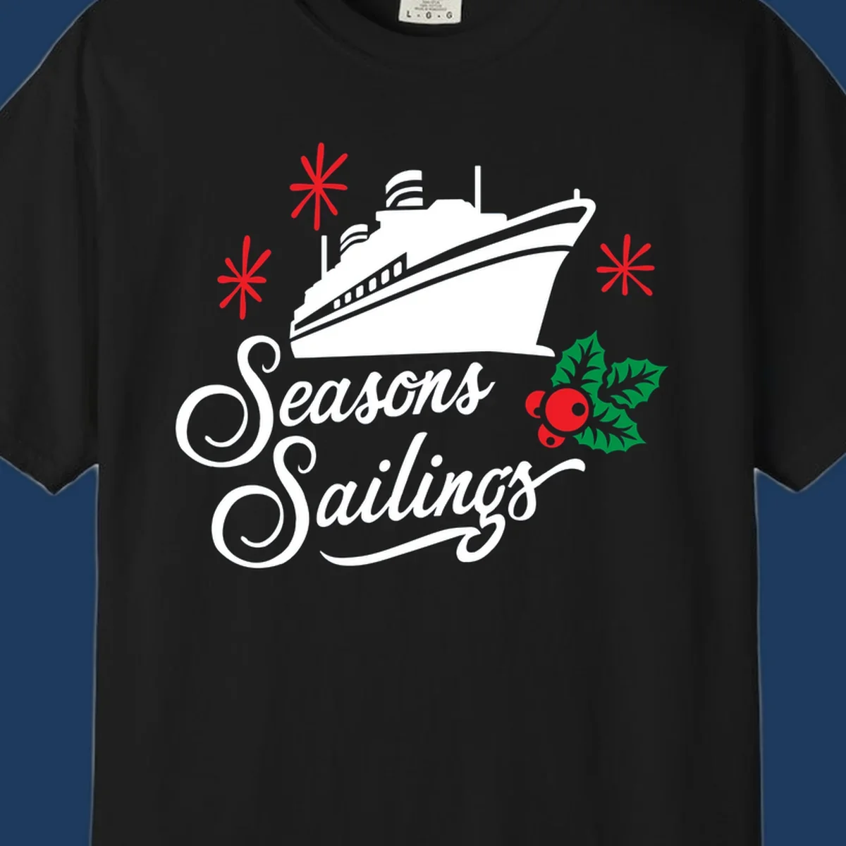 Seasons Sailings design with white cruise ship, red snowflakes, and green holly berries on gray background