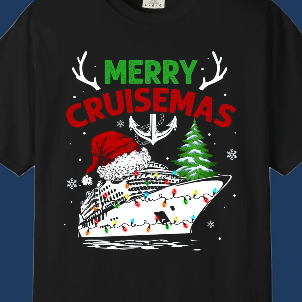Merry Cruisemas design featuring a decorated cruise ship with Santa hat, Christmas lights, evergreen tree, and nautical elements on gray background