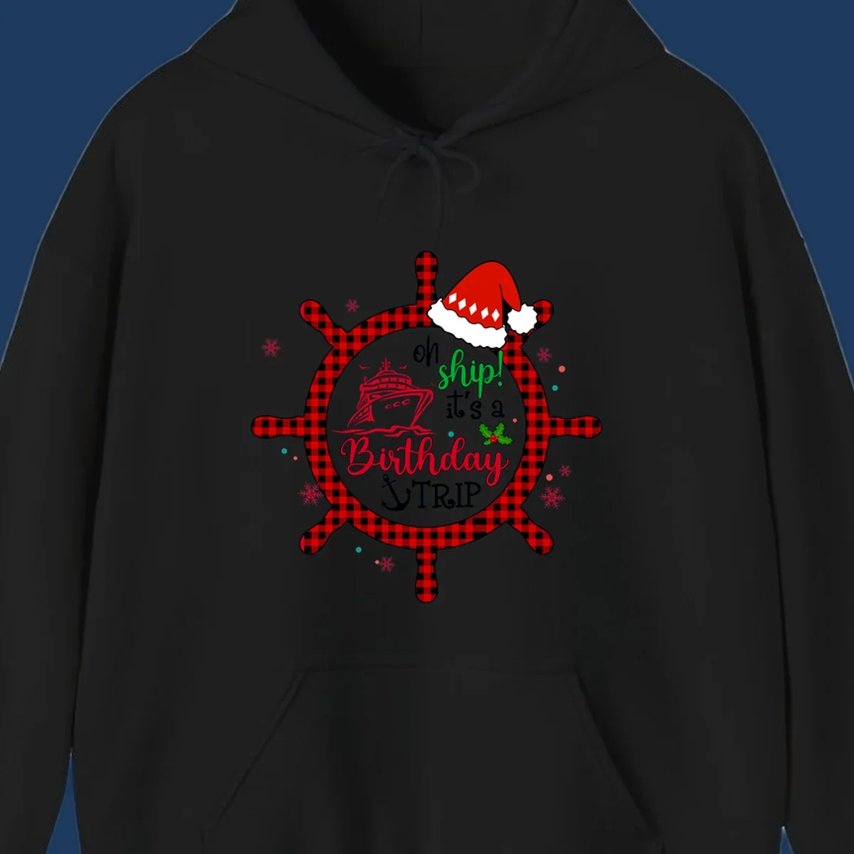 Oh ship birthday cruise design with plaid ship wheel, cruise ship illustration, Santa hat, and holly leaves on gray background