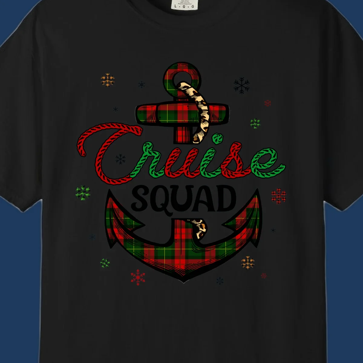 Cruise squad holiday design featuring plaid anchor with rope lettering, snowflakes, and nautical cross on gray background