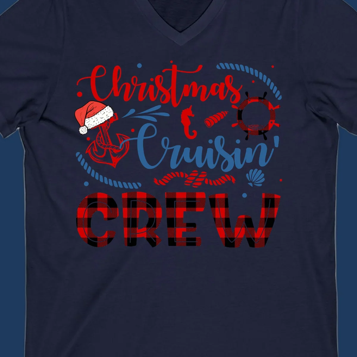 Christmas Cruisin' Cousin Crew design with Santa hat, ship wheel, anchor, and seahorse nautical elements in red, blue, and black on gray background