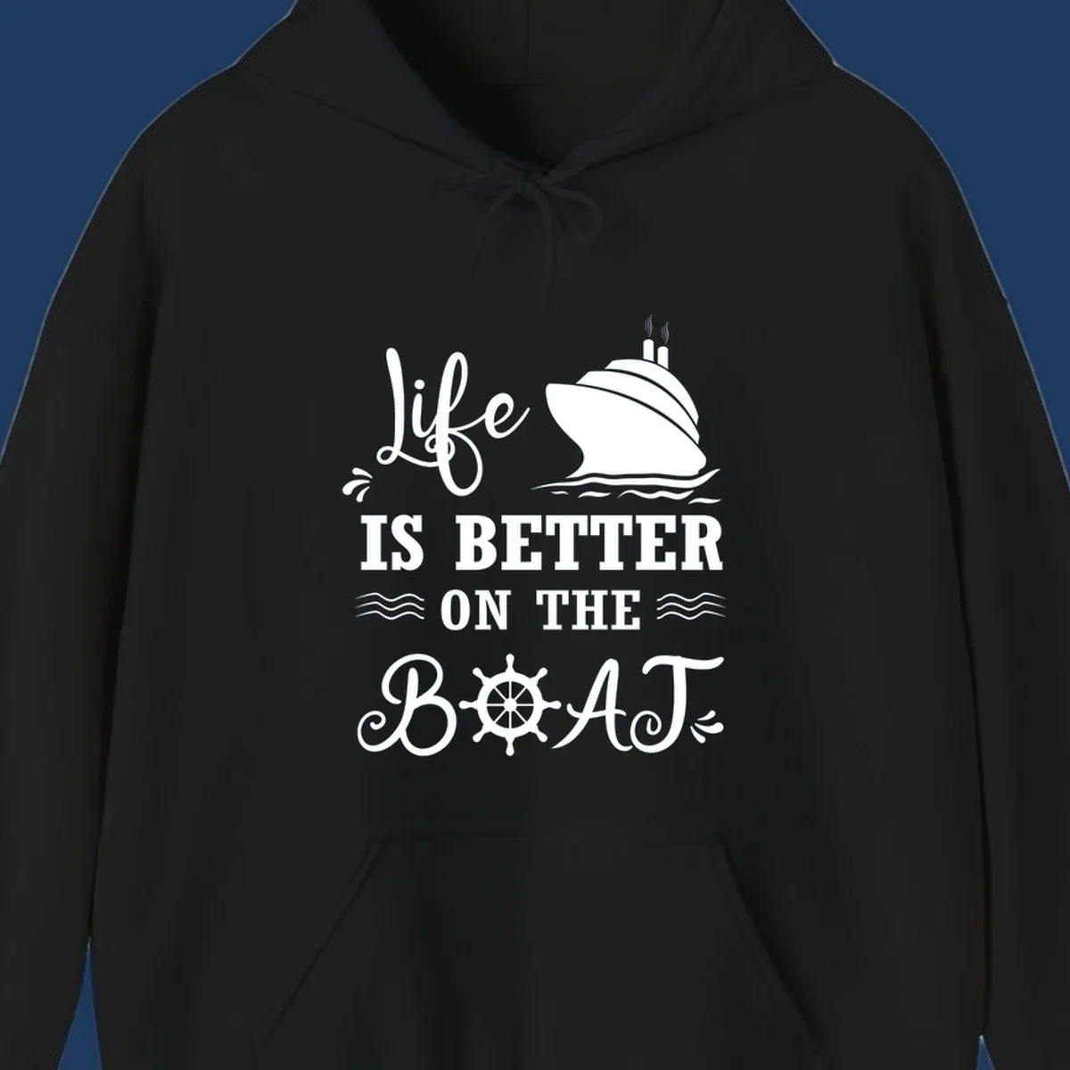 White nautical design on gray background with 'Life Is Better On The Boat' text, cruise ship, ship's wheel, and ocean waves