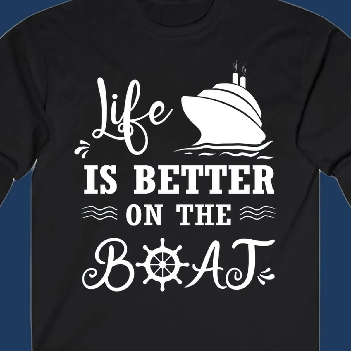 White nautical design on gray background with 'Life Is Better On The Boat' text, cruise ship, ship's wheel, and ocean waves