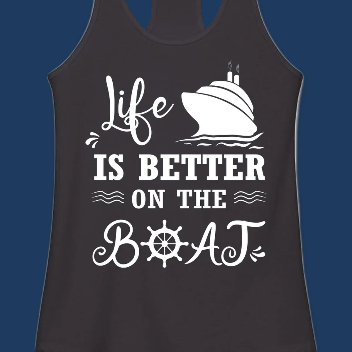 White nautical design on gray background with 'Life Is Better On The Boat' text, cruise ship, ship's wheel, and ocean waves