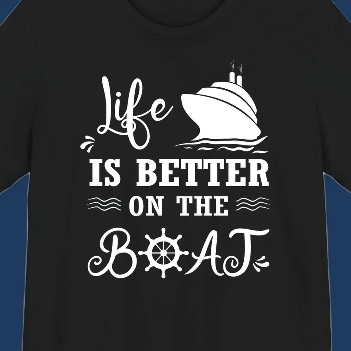 White nautical design on gray background with 'Life Is Better On The Boat' text, cruise ship, ship's wheel, and ocean waves