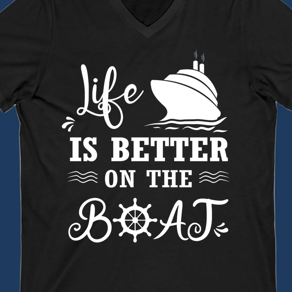 White nautical design on gray background with 'Life Is Better On The Boat' text, cruise ship, ship's wheel, and ocean waves