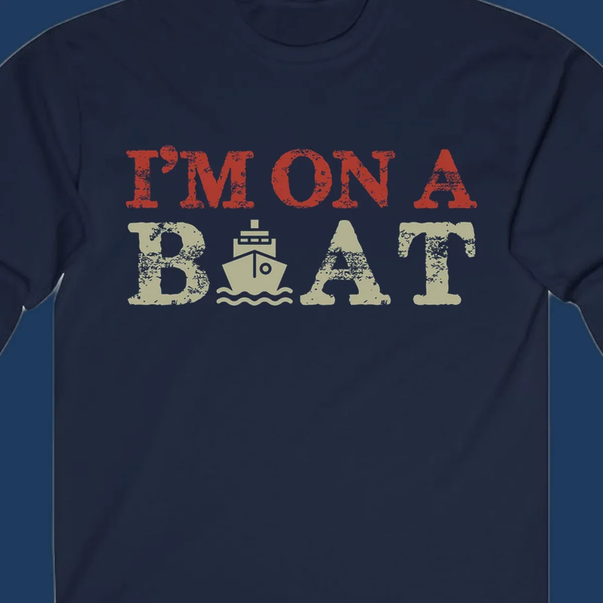 Red and cream distressed design featuring 'I'm On A Boat' text with ship and wave icons for cruise vacation apparel