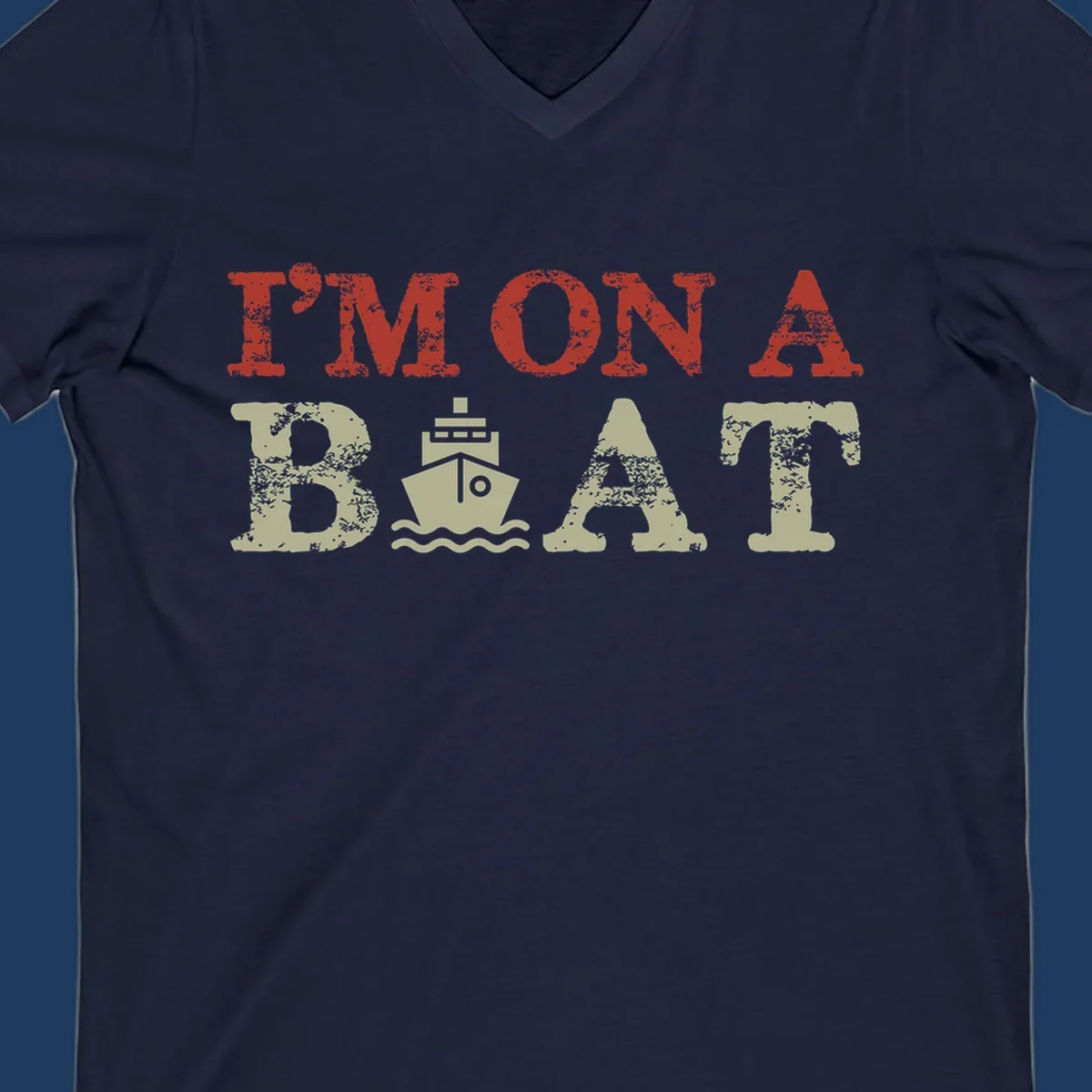 Red and cream distressed design featuring 'I'm On A Boat' text with ship and wave icons for cruise vacation apparel