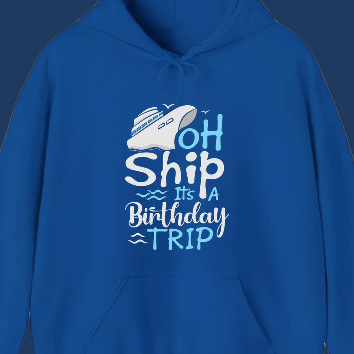 Oh Ship birthday cruise design with ship illustration, ocean waves, and blue text reading 'Oh Ship it's A Birthday TRIP' on gray background
