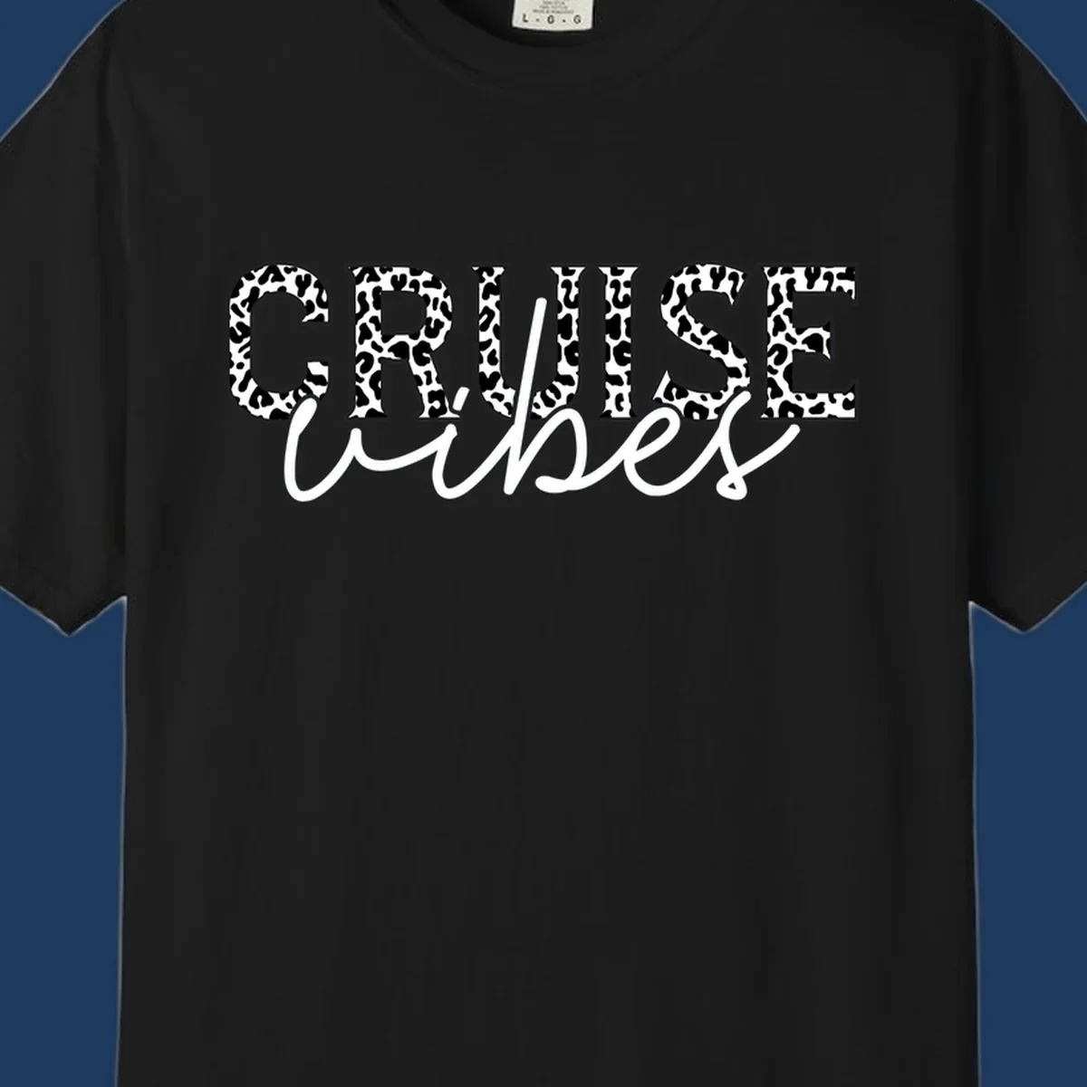 Cruise vibes leopard print design with bold black and white animal pattern lettering and cursive script