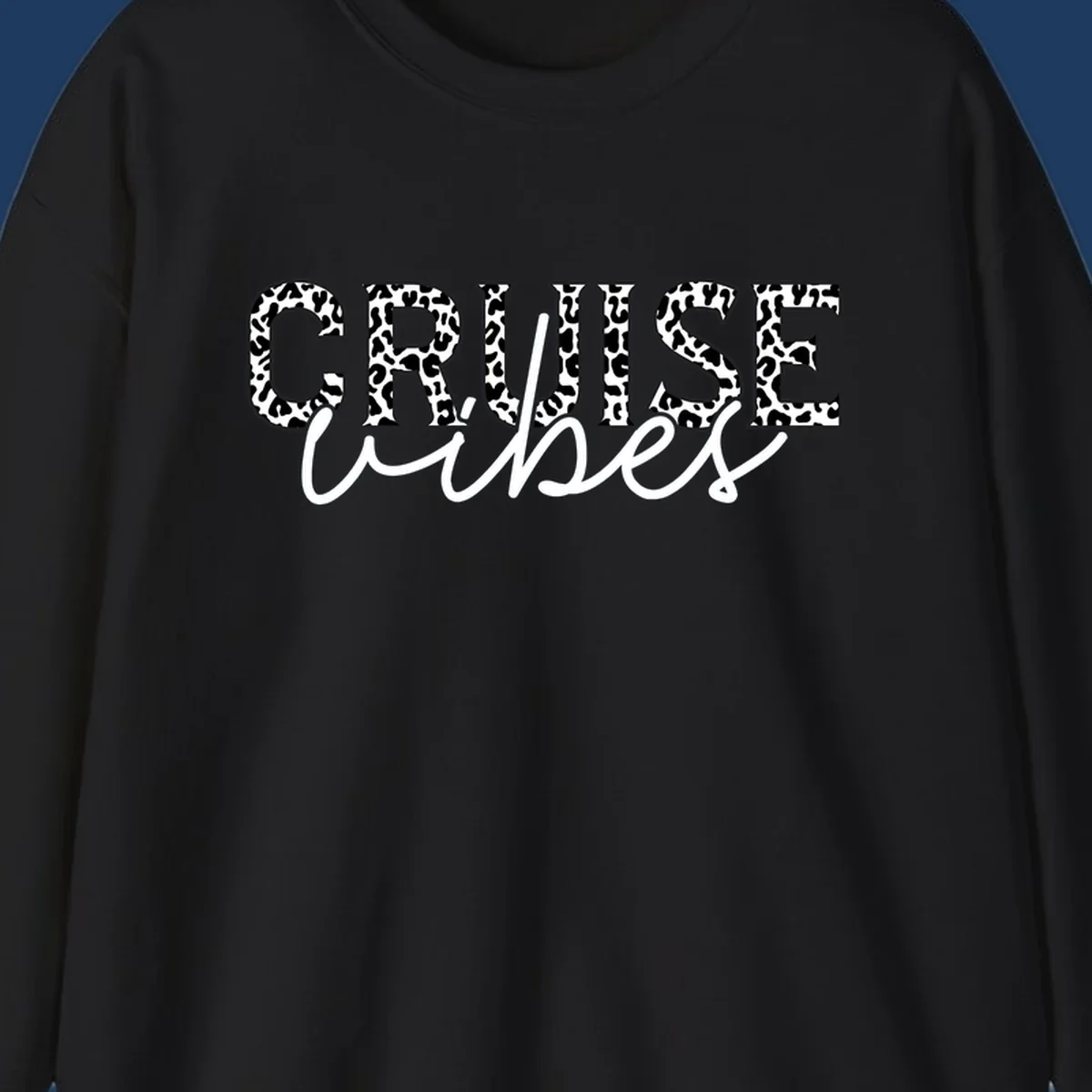 Cruise vibes leopard print design with bold black and white animal pattern lettering and cursive script
