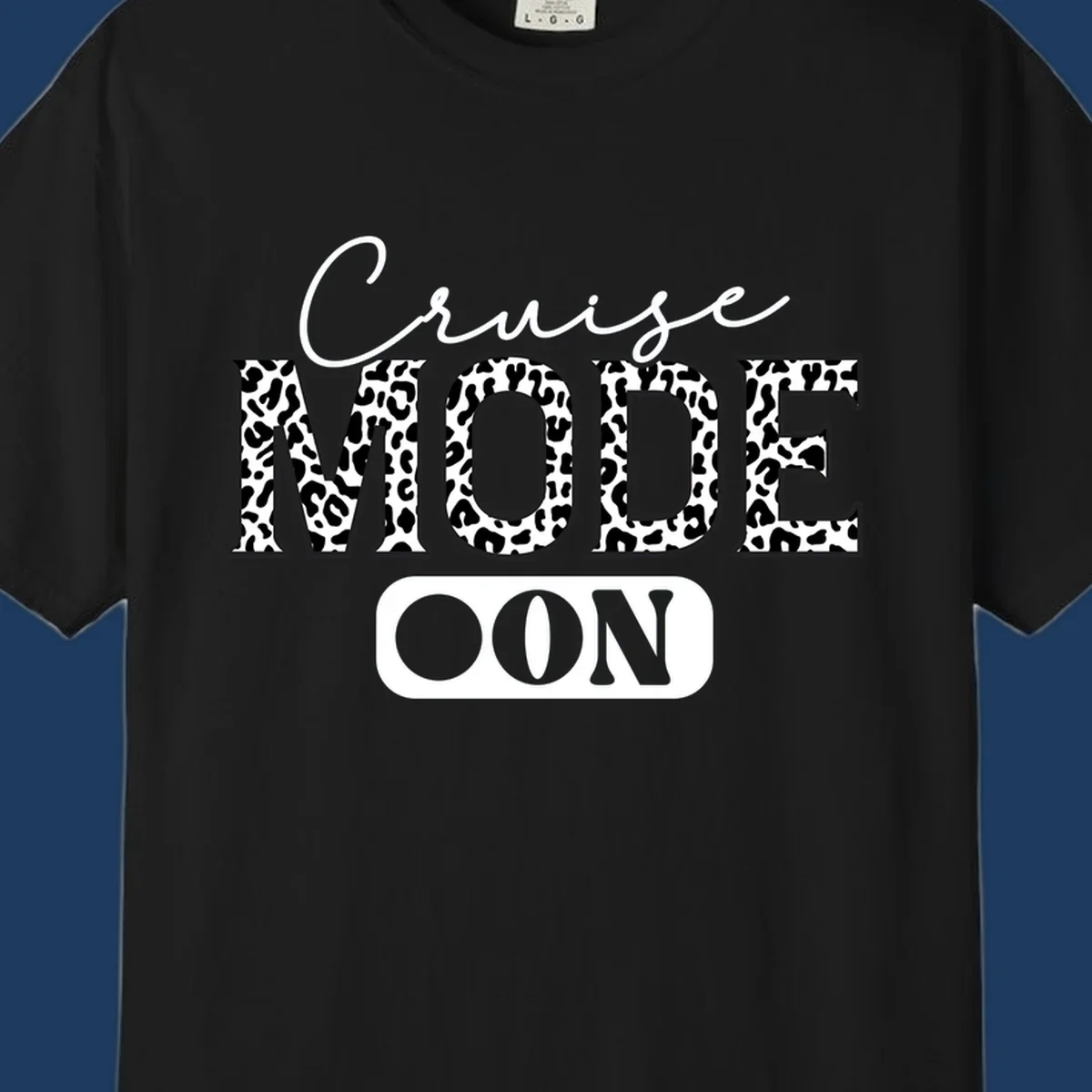Cruise mode leopard print design with cursive and bold lettering on gray background