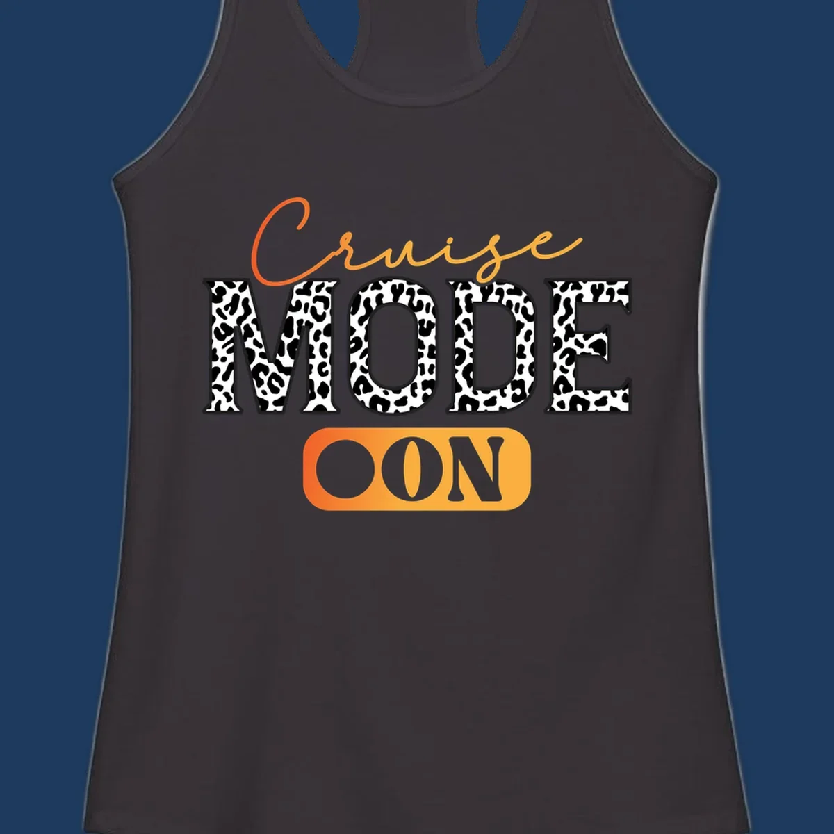 Cruise mode on design with orange cursive text and leopard print letters on gray background