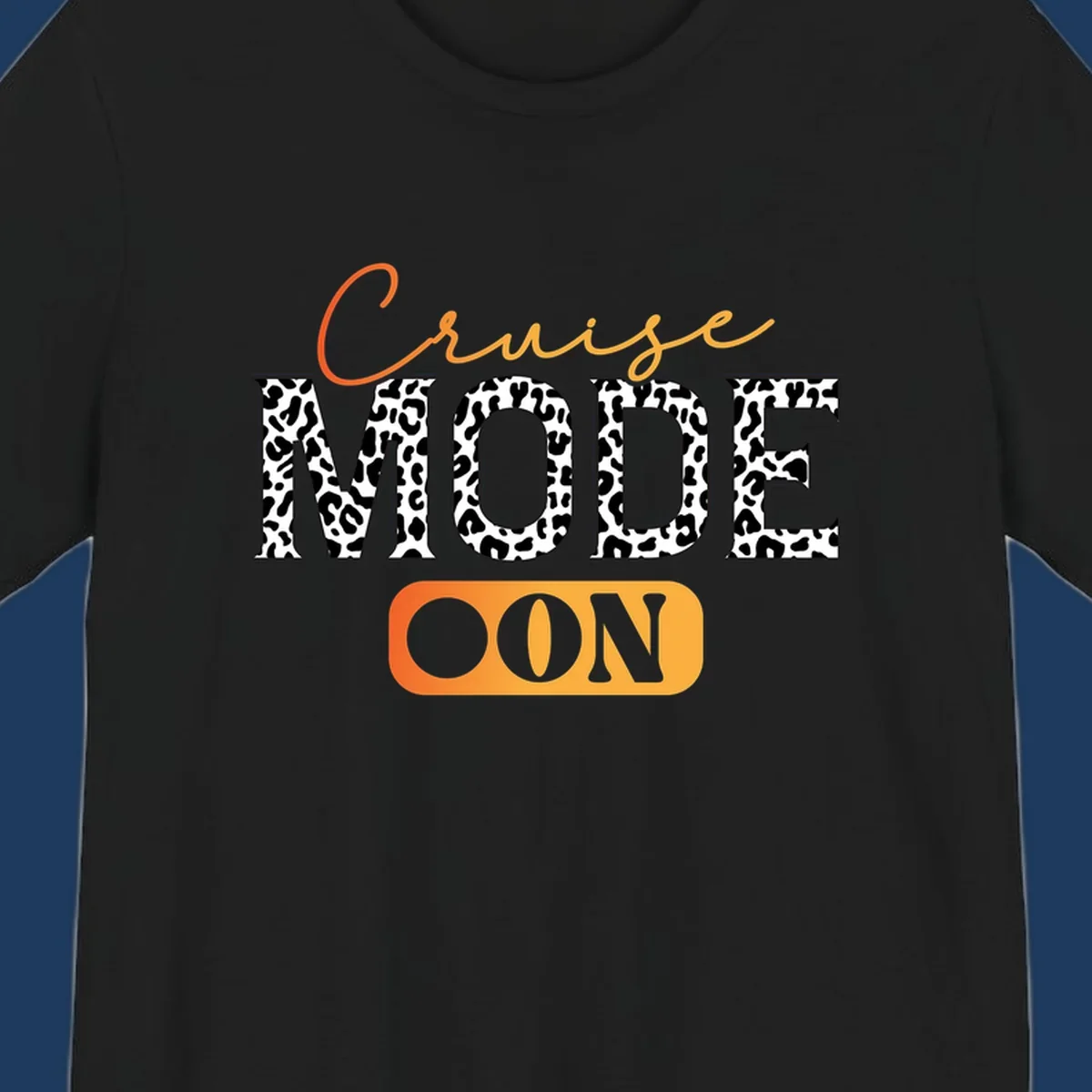 Cruise mode on design with orange cursive text and leopard print letters on gray background
