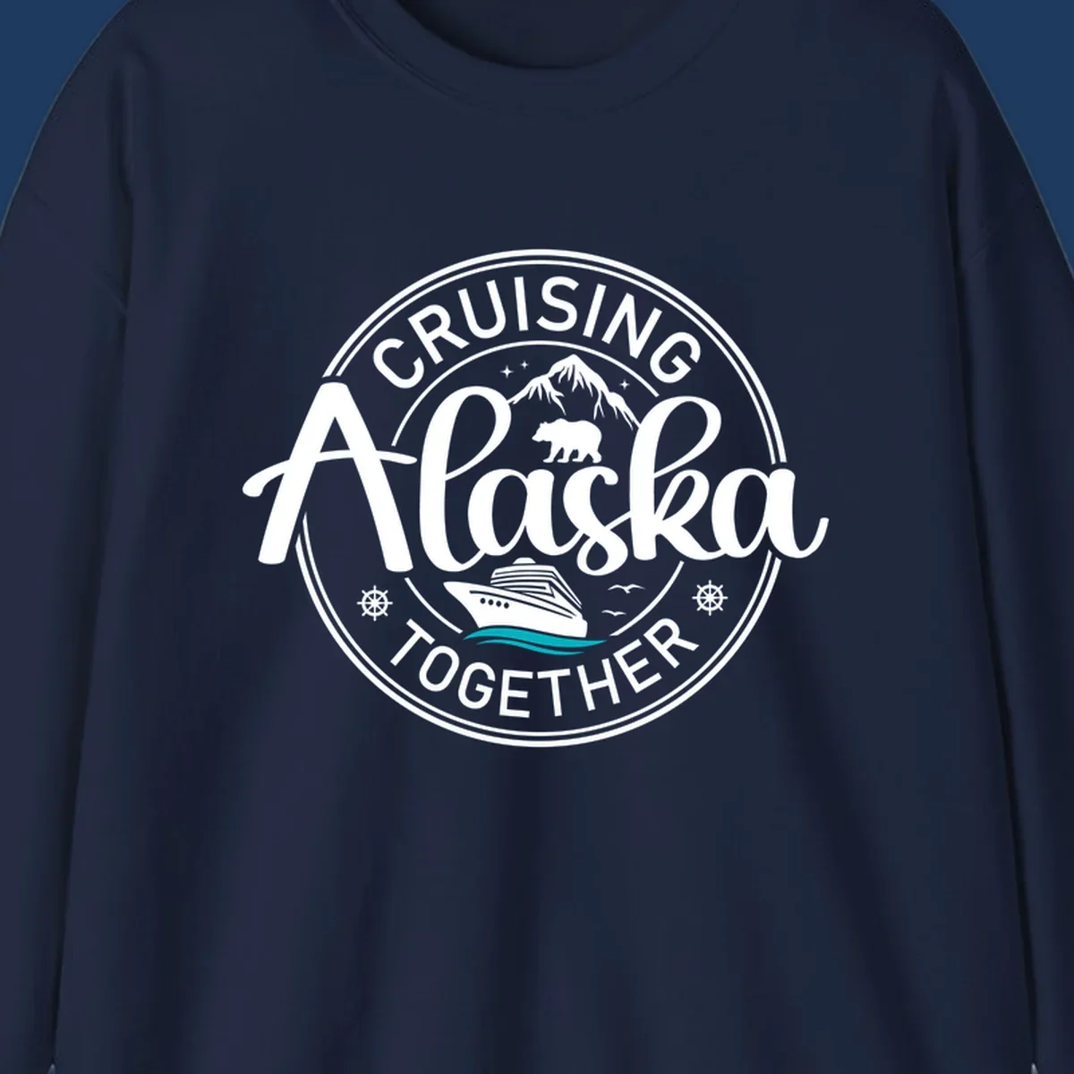 Circular badge design reading 'Cruising Alaska Together' with mountain, bear, and cruise ship illustrations in white and teal on gray background