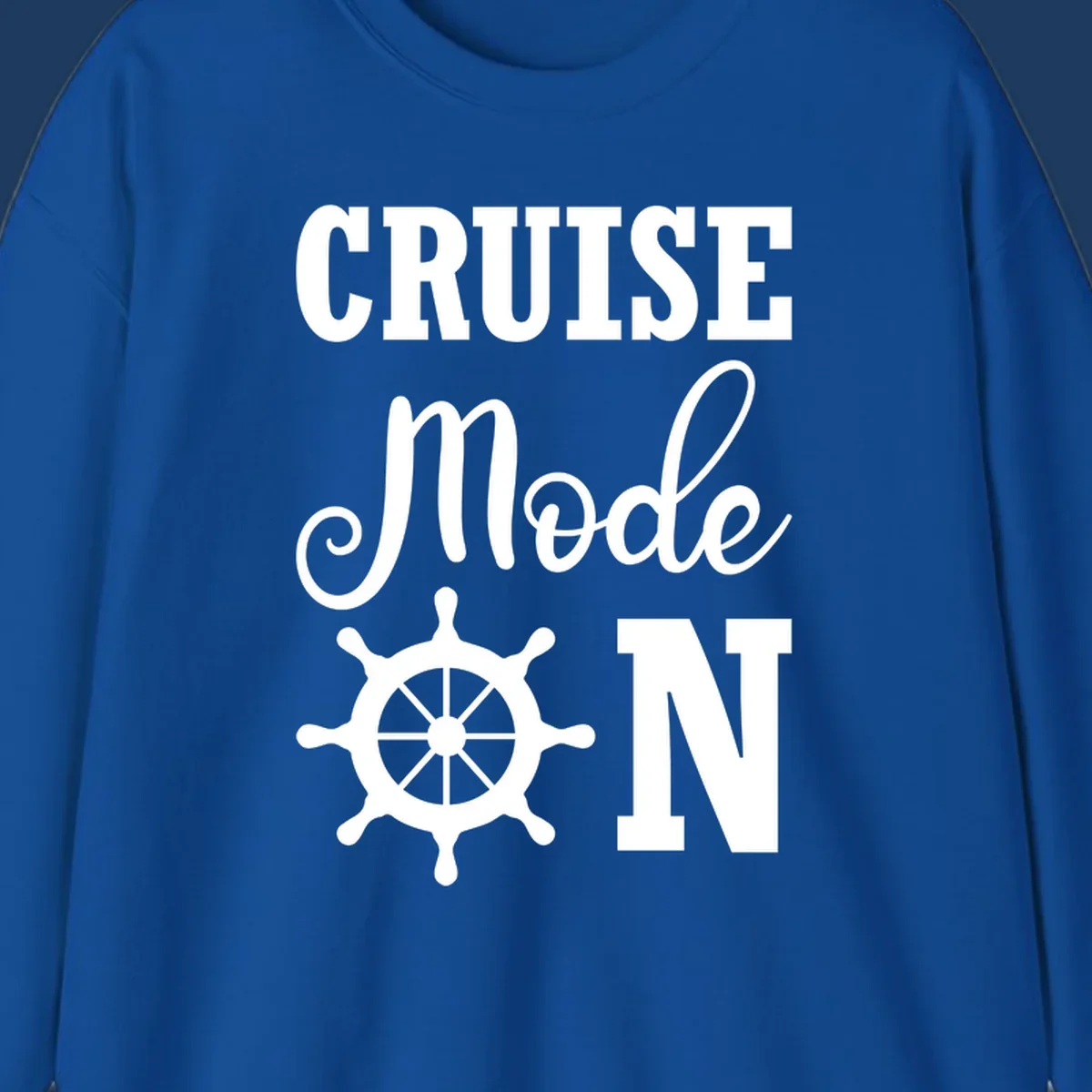 Cruise mode ship wheel design featuring white ship wheel and bold text on gray background
