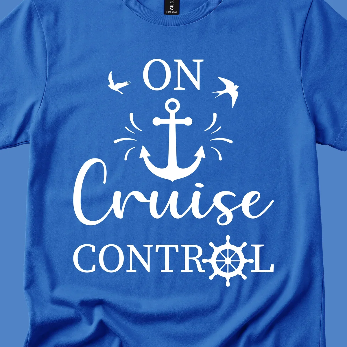 White nautical design with anchor, ship wheel, seagulls, and 'On Cruise Control' text on gray background