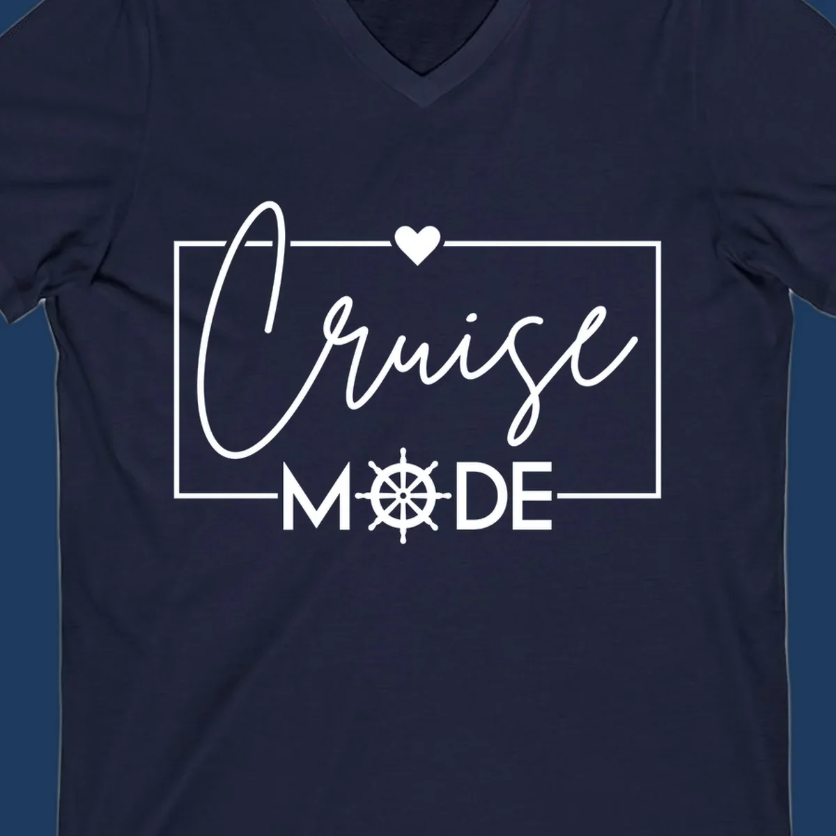 Cruise mode nautical design with elegant cursive text, ship's wheel, and heart on gray background