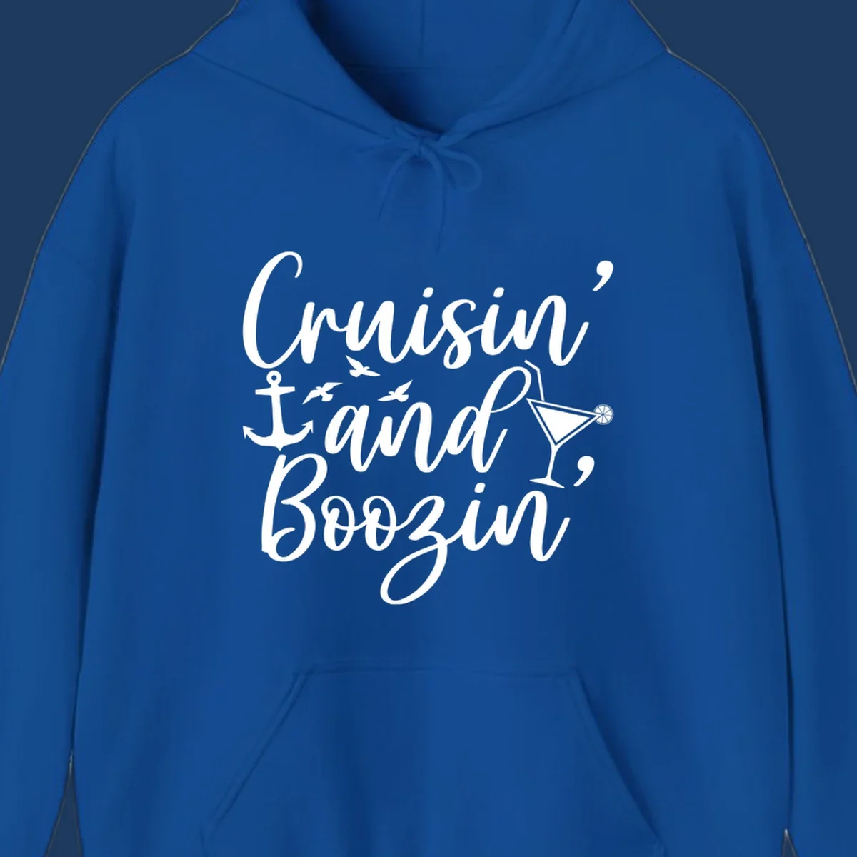 Cruisin and boozing nautical design with anchor, seagulls, and cocktail illustration on gray background