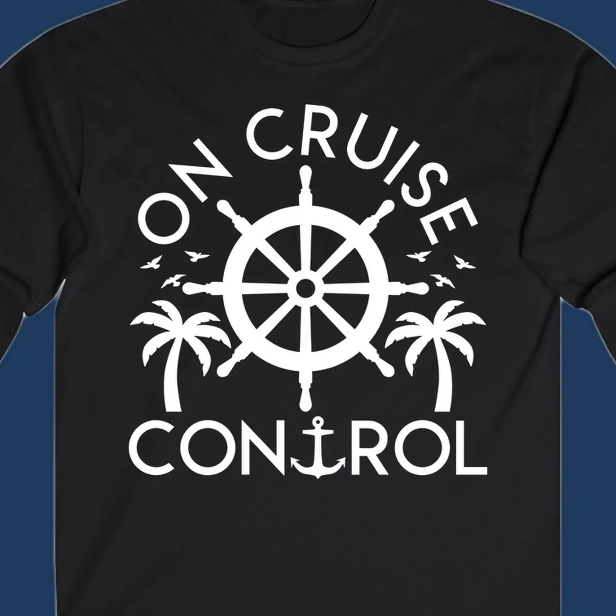 White nautical design with ship's wheel, anchor, palm trees and seagulls with 'On Cruise Control' text on gray background