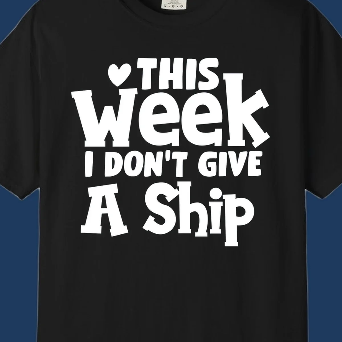 Bold white text reading 'Love This Week I Don't Give A Ship' with heart and arrow symbols on gray background