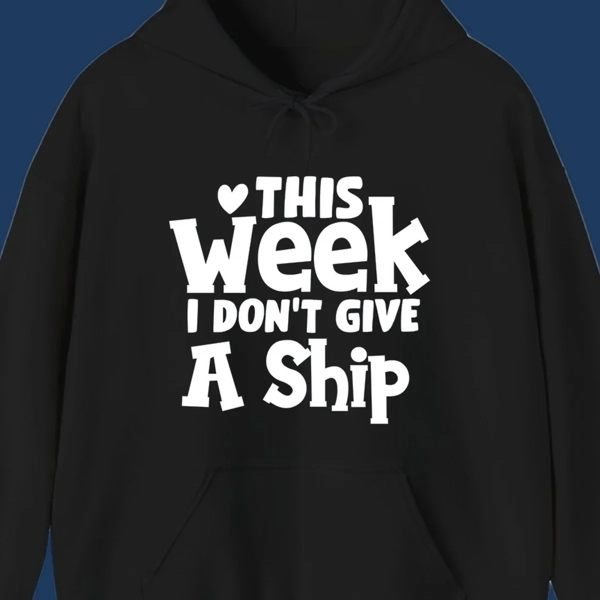 Bold white text reading 'Love This Week I Don't Give A Ship' with heart and arrow symbols on gray background