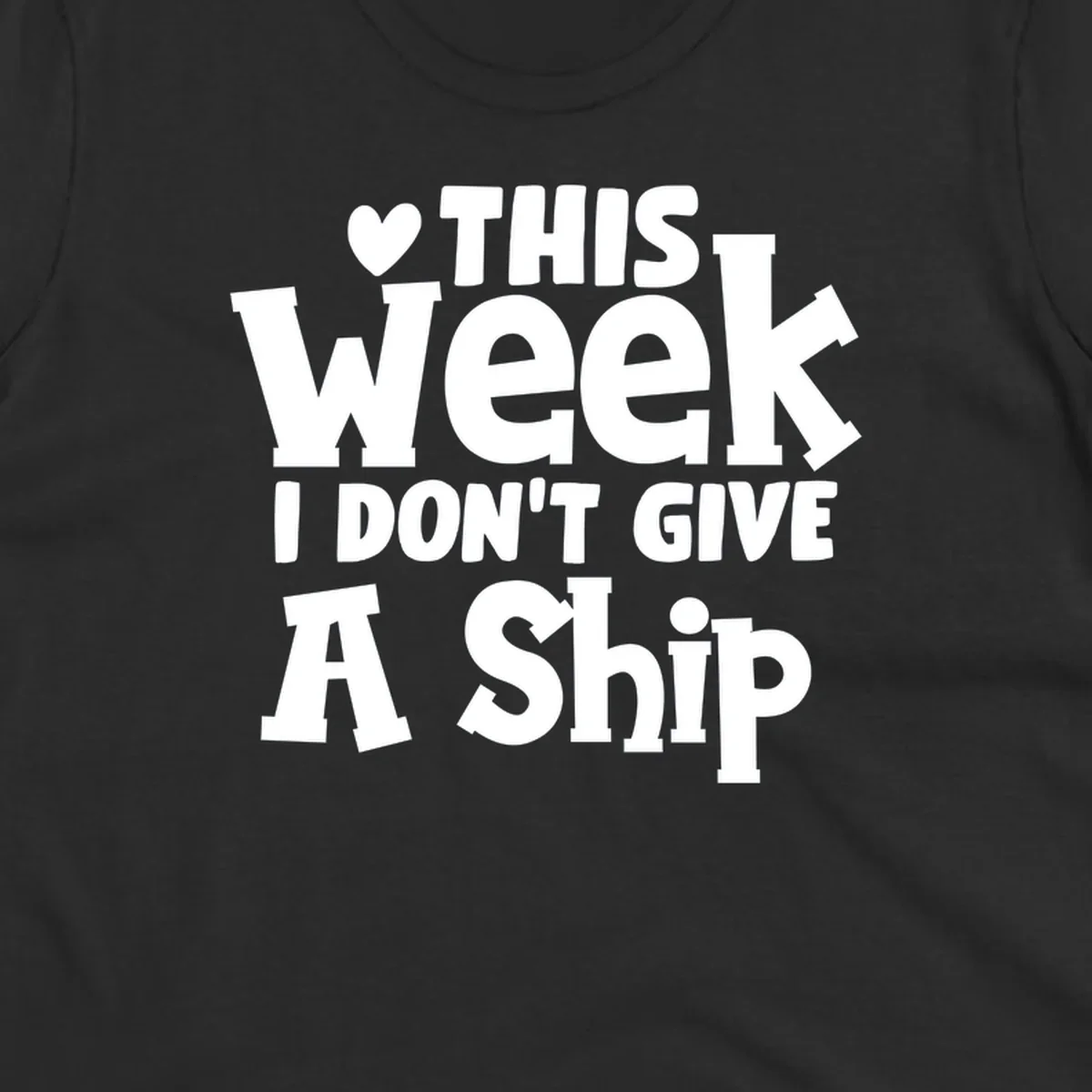 Bold white text reading 'Love This Week I Don't Give A Ship' with heart and arrow symbols on gray background