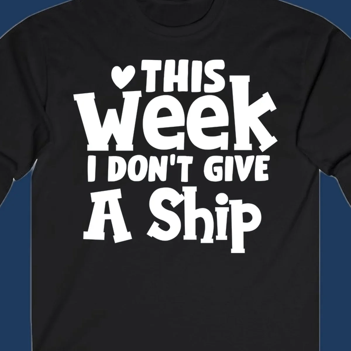 Bold white text reading 'Love This Week I Don't Give A Ship' with heart and arrow symbols on gray background