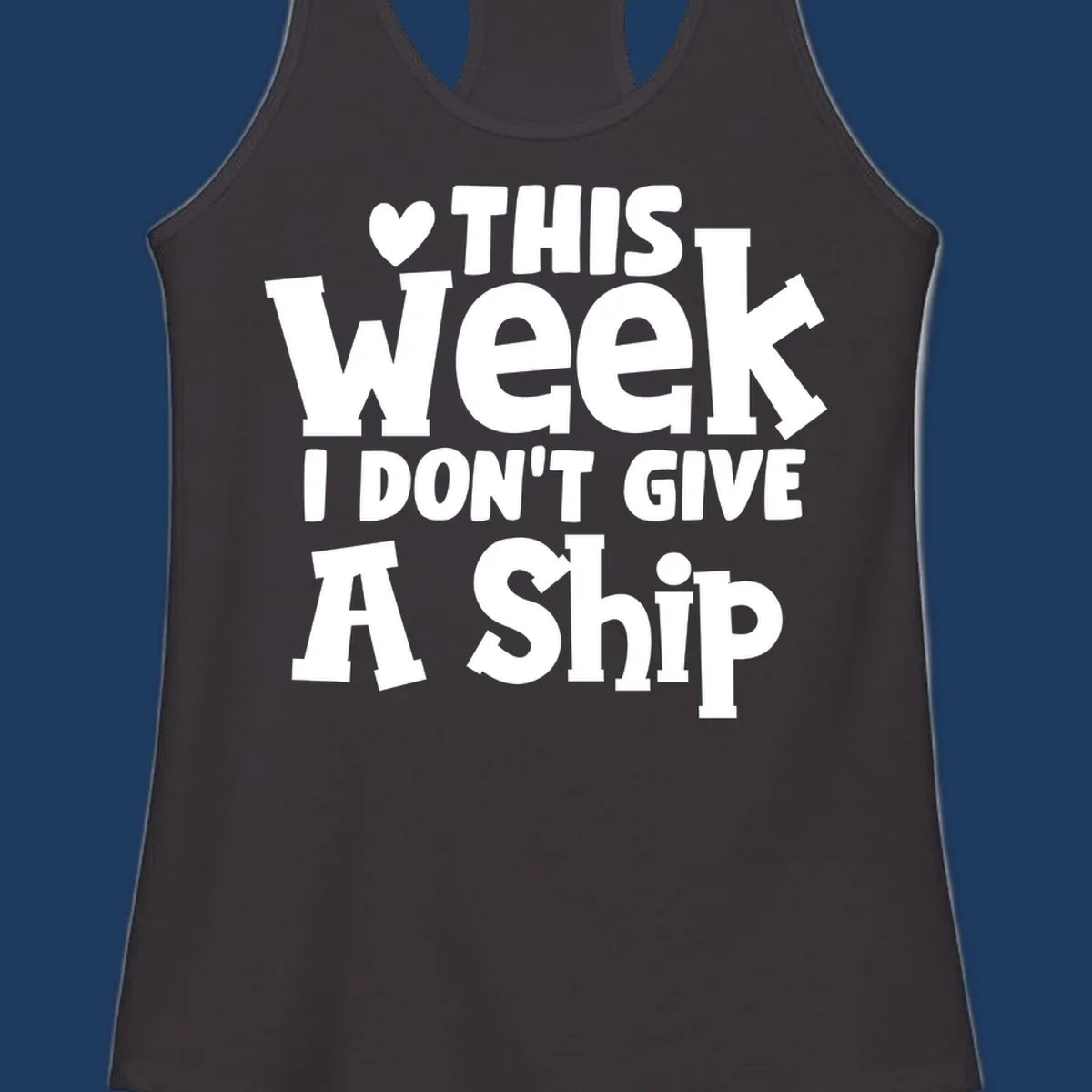 Bold white text reading 'Love This Week I Don't Give A Ship' with heart and arrow symbols on gray background