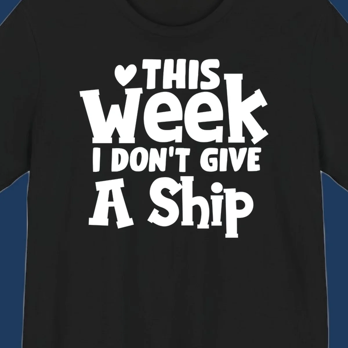 Bold white text reading 'Love This Week I Don't Give A Ship' with heart and arrow symbols on gray background